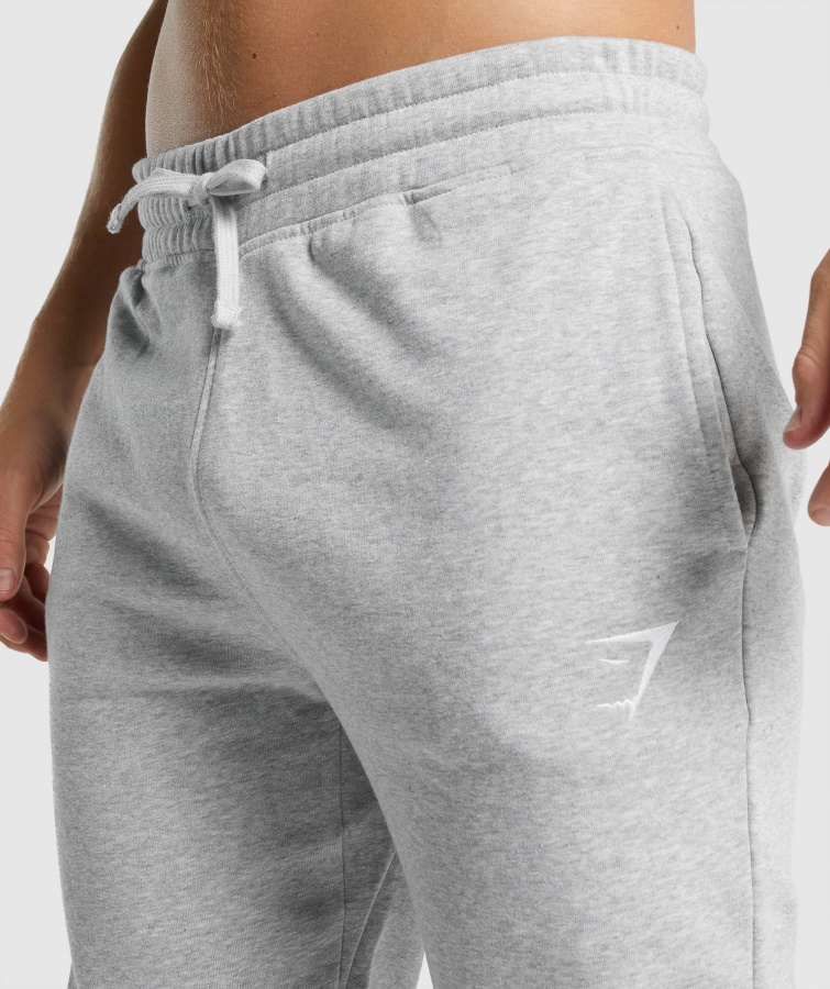 Joggers Gymshark Gris Claro Core Jaspeado Con Escudo