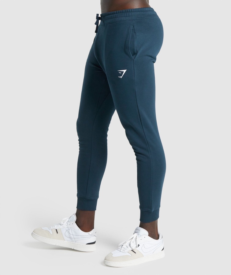 Joggers Gymshark Con Escudo Azul Marino