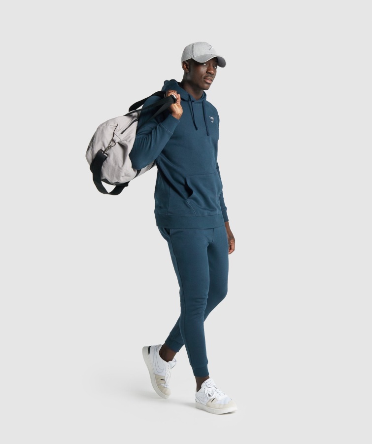 Joggers Gymshark Con Escudo Azul Marino