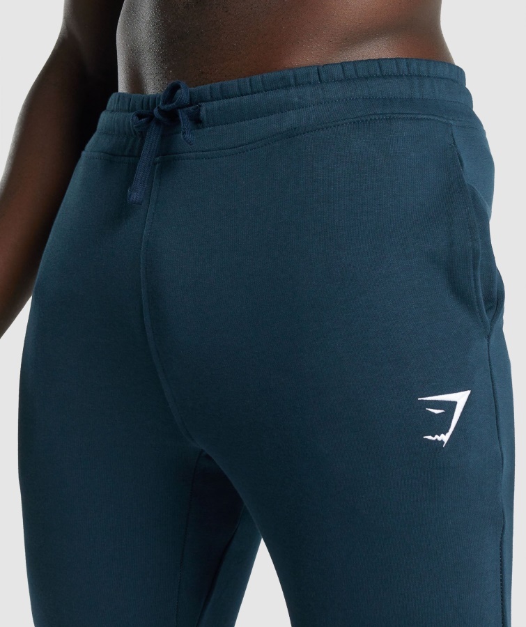 Joggers Gymshark Con Escudo Azul Marino
