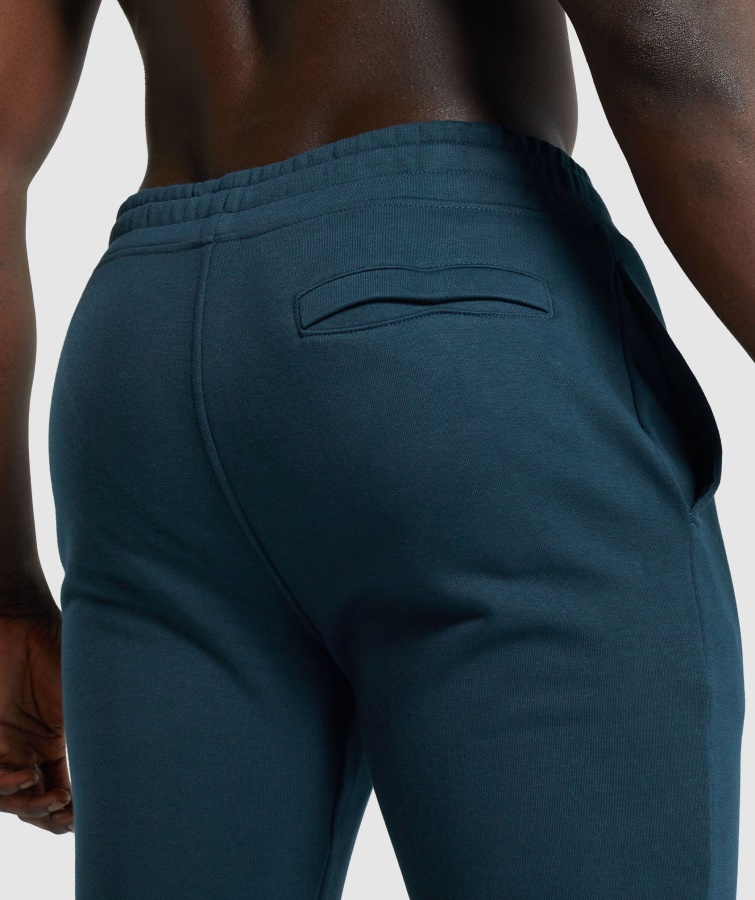 Joggers Gymshark Con Escudo Azul Marino